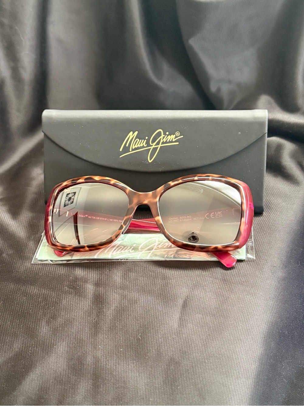 Maui Jim Orchid sunglasses in tortoise and raspberry multi-colored frame